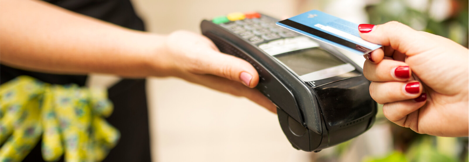 person using a debit/credit card for payment